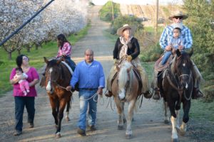 Burroughs Family on Horseback on farm