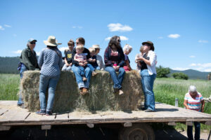 Ranchers on a hay wagon